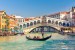 Gondola-near-Rialto-Bridge-in-Venice